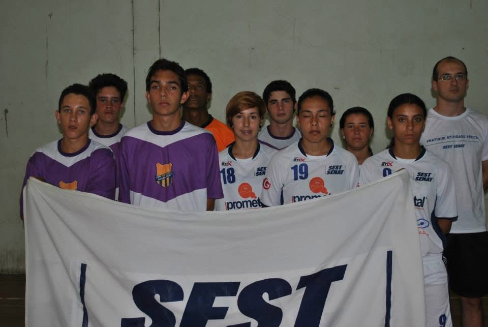 Equipe SEST SENAT com faixa